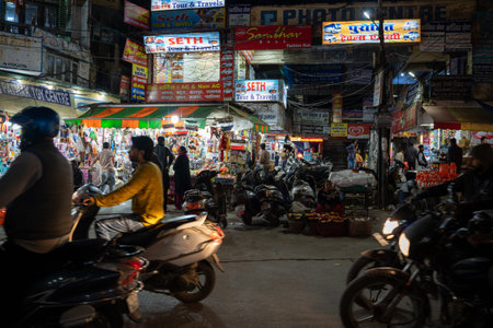 Haridwar, India - Feburary 22, 2020: Motorbike drivers navigate their vehicles through the crowded...