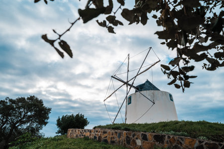 A traditional Portuguese windmill near the Algarve town of Odeceixe, Portugalの写真素材