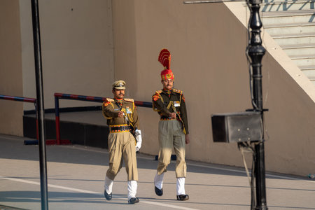 Attari, India - Febuary 8, 2020: Indian Border Security Force march towards the Wagah Border during...