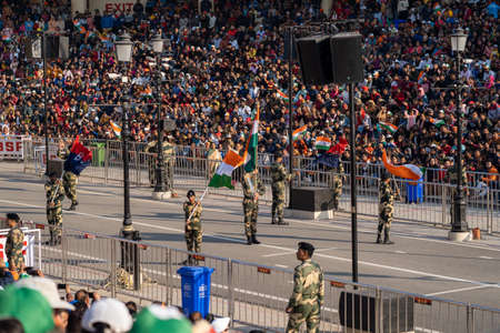 Attari, India - Febuary 8, 2020: Indian Border Security Force members start the parade at the Wagah Border Closing ceremony with Pakistanのeditorial素材