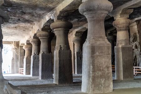 Pillars at the Elephanta Caves ruins in Mumbai (Bombay) India at Gharapuri island.の写真素材