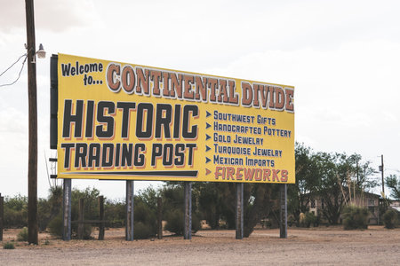 JUNE 30 2018 - LORDSBURG, NEW MEXICO: Billboard advertising the historic Bowlin's Continental Divide Trading post, selling fireworks, souvenirs, gifts, food and drinks to travelers on US Interstate 10のeditorial素材