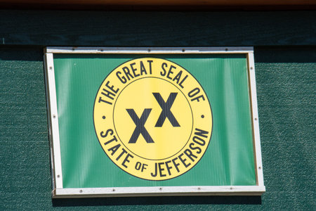 JULY 8 2017-Bandon, Oregon: Flag for the Great Seal of State of Jefferson, a proposed 51st state, which would span rural Northern California and Southern Oregon. The flag has a gold mining panのeditorial素材