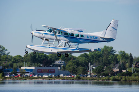 AUGUST 31 2018 - DULUTH, MN: Seaplane lands on the water at Sky Harbor Airport along Lake Superior...