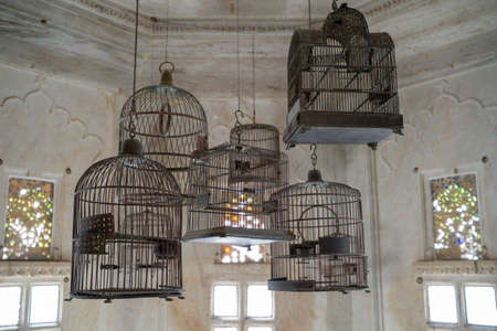 Udaipur, India - March 14, 2020: Carrier pigeons cages in a room at Badi Mahal inside the City Palace of Udaipur India.のeditorial素材