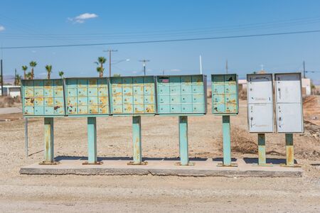 Rusty mailboxes in the deserted community of Bombay Beach California, near the Salton Seaの写真素材