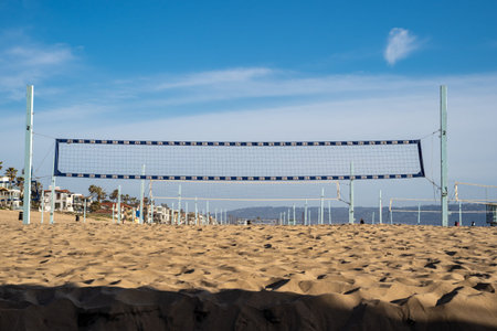 Manhattan Beach, California - March 26, 2019: Beach volleyball nets set up in the sand. Manhattan...