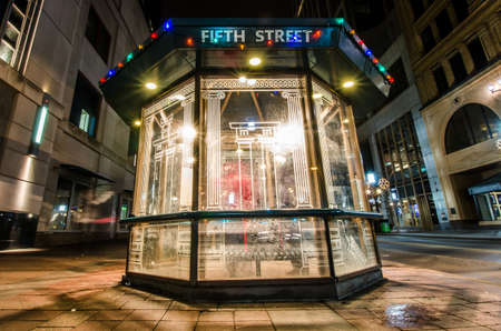 Minneapolis, MN - March 1, 2018 : View of a MetroTransit bus shelter warming area hut for customers using public transportation on Nicollet Mall in downtown Minneapolis at nightのeditorial素材
