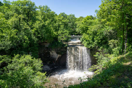 View of the upper falls of Minneopa Falls waterfall at Minneopa State Park in Mankato Minnesotaの写真素材