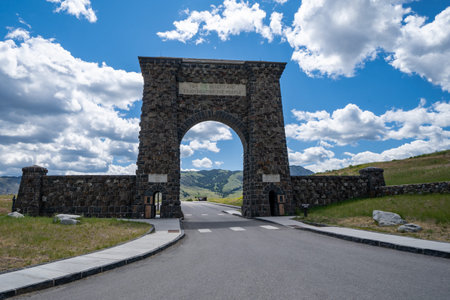 Gardiner, Montana - July 1, 2020: The famous Roosevelt Arch at the North Entrance of Yellowstone...