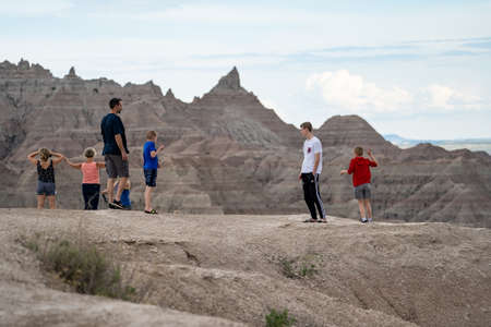 Scenic, South Dakota - June 21, 2020: Tourists family explores and enjoys the scenery in Badlands National Park while on summer vacationのeditorial素材