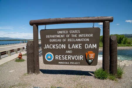 Grand Teton National Park, Wyoming - June 26, 2020: Sign for the Jackson Lake Dam and Reservior, part of the US Department of the Interior Bureau of Reclamationのeditorial素材