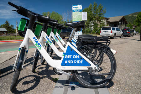 Jackson, Wyoming - June 26, 2020: Bike rack of Start Bikes, a bike sharing service in downtown Jackson Holeのeditorial素材