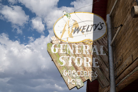 Dubois, Wyoming - July 26, 2020: Sign for Weltys General Store, selling groceries and ice. Vintage...