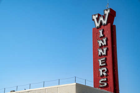 Winnemucca, Nevada - August 5, 2020: Exterior view of Winners Casino, and hotel with its classic retro neon sign in the downtown areaのeditorial素材
