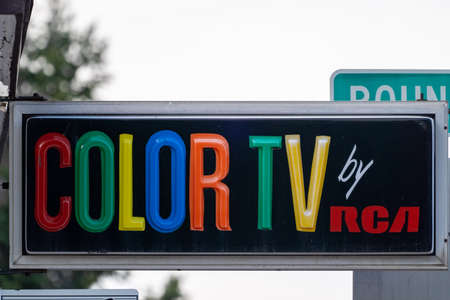 West Yellowstone, Montana - September 24, 2020: Old fashioned Color TV by RCA sign outside of a motel advertising their amenitiesのeditorial素材