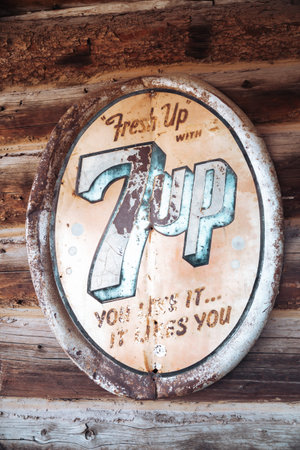 Polebridge, Montana - July 28, 2020: Old vintage retro 7up soda sign against a wood wallのeditorial素材
