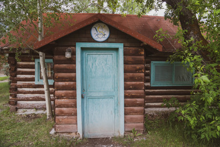 Bannack, Montana - June 29, 2020: Adorable wooden log cabin, abandoned, in the Bannack Ghost Townのeditorial素材