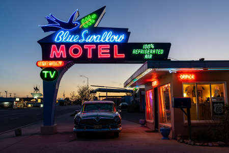 Tucamcari, New Mexico - May 6, 2021: Close up of the Blue Swallow Motel neon sign, a famous classic Route 66 motelのeditorial素材