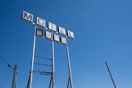 Large sign for an abandoned motel and cafe, taken in Texas along old historic Route 66の写真素材