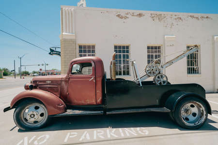 Shamrock, Texas - May 6, 2021: The classic Conoco Tower Gas Station and U-Drop Inn along historic Route 66 - old truck parked outsideのeditorial素材