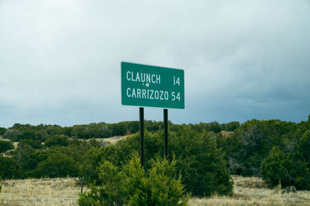 Direction and mileage sign between two new mexico cities - Claunch and Carrizozoの写真素材