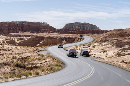 Utah, USA - May 14, 2021: Cars drive into Goblin Valley State Park in Utah to see the bizarre rock...