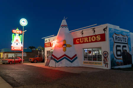 Tucamcari, New Mexico - May 6, 2021: Tepee Curios gift shop and neon sign, a famous classic Route 66 landmark, at nightのeditorial素材