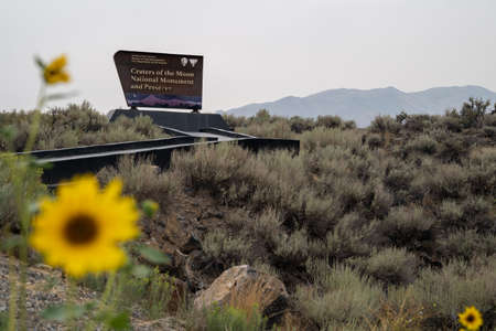 Idaho, USA - August 19, 2021: Sign for Craters of the Moon National Monument, on a cloudy dayのeditorial素材