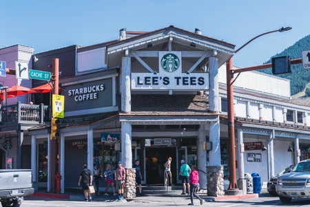 Jackson, Wyoming - August 9, 2021: Lee's Tees and a Starbucks coffee shop in downtown Jackson Wyoming near the town squareのeditorial素材