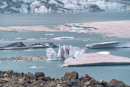 Icebergs in Upper Grinnell Lake, found at Grinnell Glacier Trail in Glacier National Park