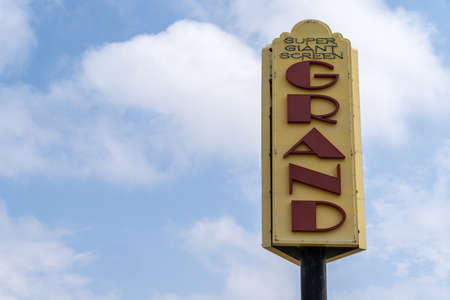 Bismarck, North Dakota - August 27, 2021: Sign for the Grand Movie Theater against a partly cloudy skyのeditorial素材
