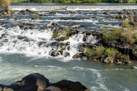 Detail shot of beautiful Idaho Falls waterfall during summerの写真素材