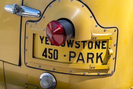 Wyoming, USA - June 29, 2021: Close up of the classic 1940's vintage White Model 706 Yellow school...