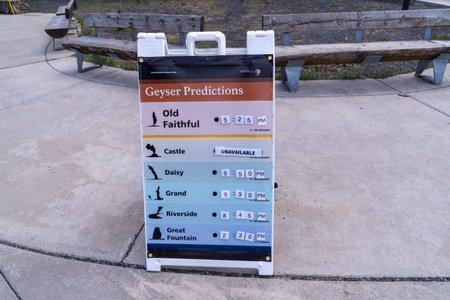 Wyoming, USA - June 29, 2021: Information board with geyser predictions for tourists in Yellowstone National Parkのeditorial素材