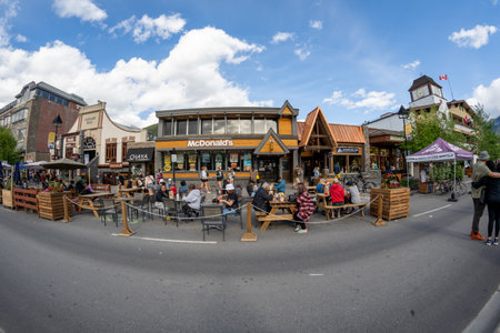 Banff, Alberta, Canada - July 10, 2022: Fisheye view of the famous Banff Avenue in Banff National Park in Canada, featuring McDonaldsのeditorial素材