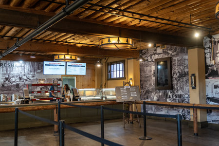Wyoming, USA - July 20, 2022: Queues for lines at the grill and ice cream parlor in the Old Faithful gift shopのeditorial素材