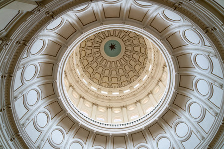 Austin, Texas - May 23, 2022: Inside the rotunda of the Texas State Capitol Building, the domed ceiling with the word Texas and lone star.のeditorial素材