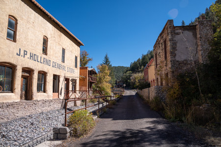 Mogollon, New Mexico - October 20, 2022: The streets of the Mogollon ghost town, a former mining town, and the JP Holland General Storeのeditorial素材