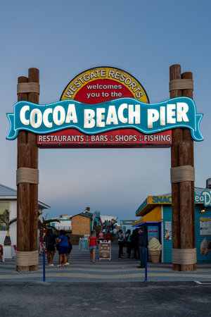 Cocoa Beach, Florida - December 29, 2022: Illuminated neon sign for the Cocoa Beach Pier at duskのeditorial素材