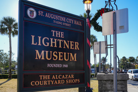 St. Augustine, Florida - December 28, 2022: Sign for the Lightner Museum and Alcazar Courtyard shops and city hallのeditorial素材