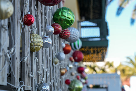 Green, red and silver gold metallic Christmas bauble balls decorated for the holiday season, useful for backgroundsの写真素材