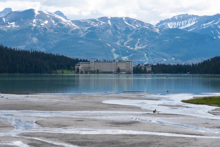 Alberta, Canada - July 9, 2022: Unqiue view of the Fairmont Chateau Lake Louise hotel across the lakeのeditorial素材