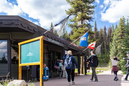 Jasper, Alberta, Canada - July 13, 2022: Tourists file into the Maligne Lake gift shop after going on a boat cruiseのeditorial素材