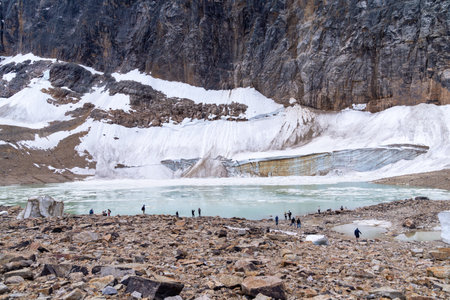 Jasper, Alberta, Canada - July 13, 2022: Tourists explore the glacial lake near Mt. Editih Cavell in Jasper National Parkのeditorial素材