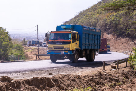 Mai Mahiu, Kenya, Africa - March 4, 2023: Heavy truck traffic up the Escarpment - Kamandura Narok Mai Mahiu Road, along the Great Rift Valleyのeditorial素材