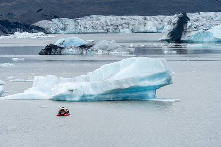 Vatnajokull, Iceland - July 7, 2023: Tourists leave on iceberg zodiac boat tours to view the Fjallsarlon glacier lagoonのeditorial素材