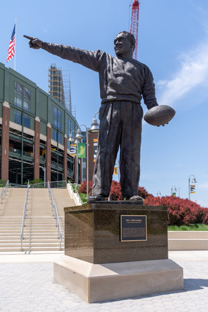 Green Bay, Wisconsin - June 2, 2023: Earl L Curly Lambeau statue outside Lambeau Field, home of the Green Bay Packers NFL teamのeditorial素材