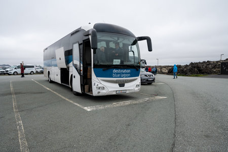 Grindavik, Iceland - June 29, 2023: Tour bus shuttle taking tourists to the Blue Lagoon from the airportのeditorial素材