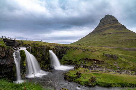 Kirkjufellsfoss waterfall and mountain, long exposure, in Iceland on the Snaefellsnes Peninsulaの写真素材